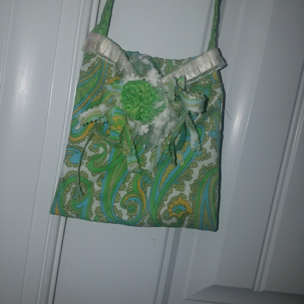 Homemade green frilly purse